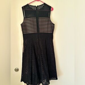 Black Sleeveless lace dress with mesh top.
